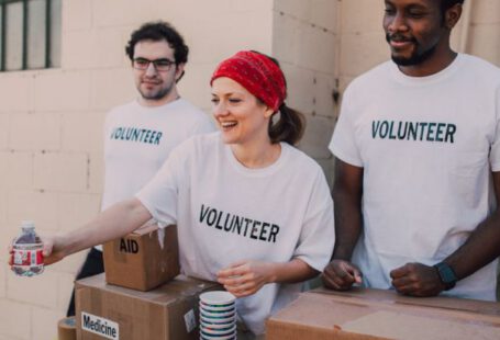 Volunteering Abroad - Three People Donating Goods